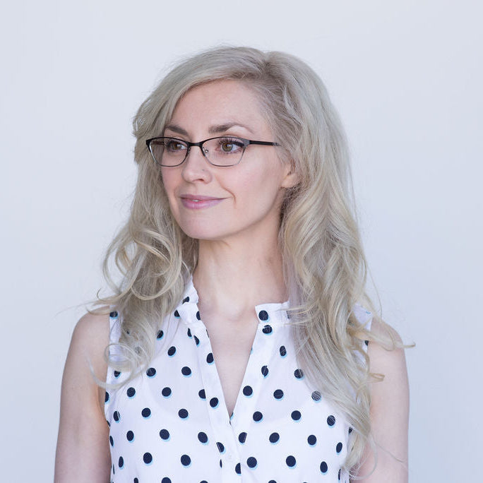 Teresa petite glasses in black and silver — thin metal cat-eye eyeglass frames for small faces, side portrait