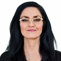 Teresa petite glasses in gold — thin metal cat-eye eyeglass frames for small faces, 49mm lens width, side portrait